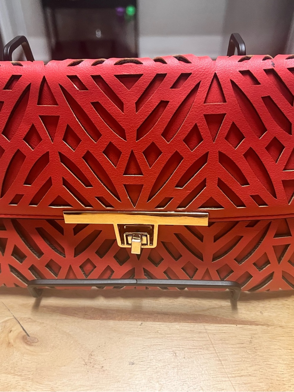 Red Laser-Cut Leather Shoulder Bag with Gold Hardware